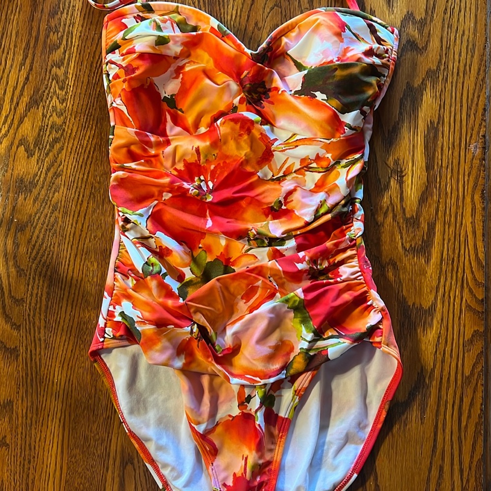 Multi color floral one piece bathing suit never worn